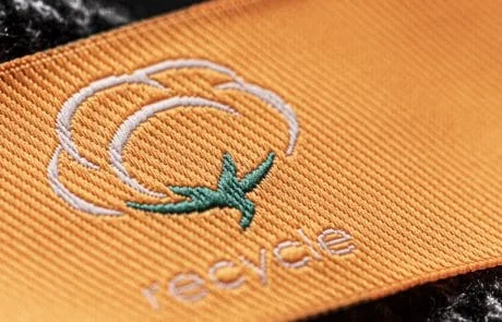 Woven Label with Recycling Symbol